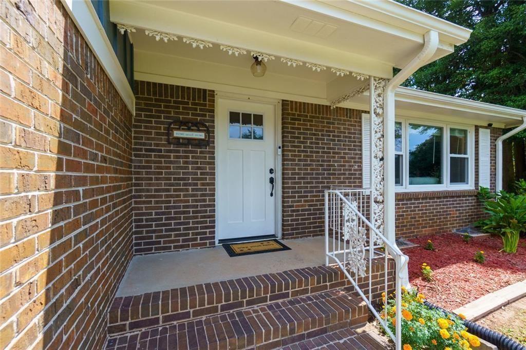 5800 Cedar Lane Southwest Mableton, GA 30126 - Photo 5 of 41 a view of a brick house with wooden floor