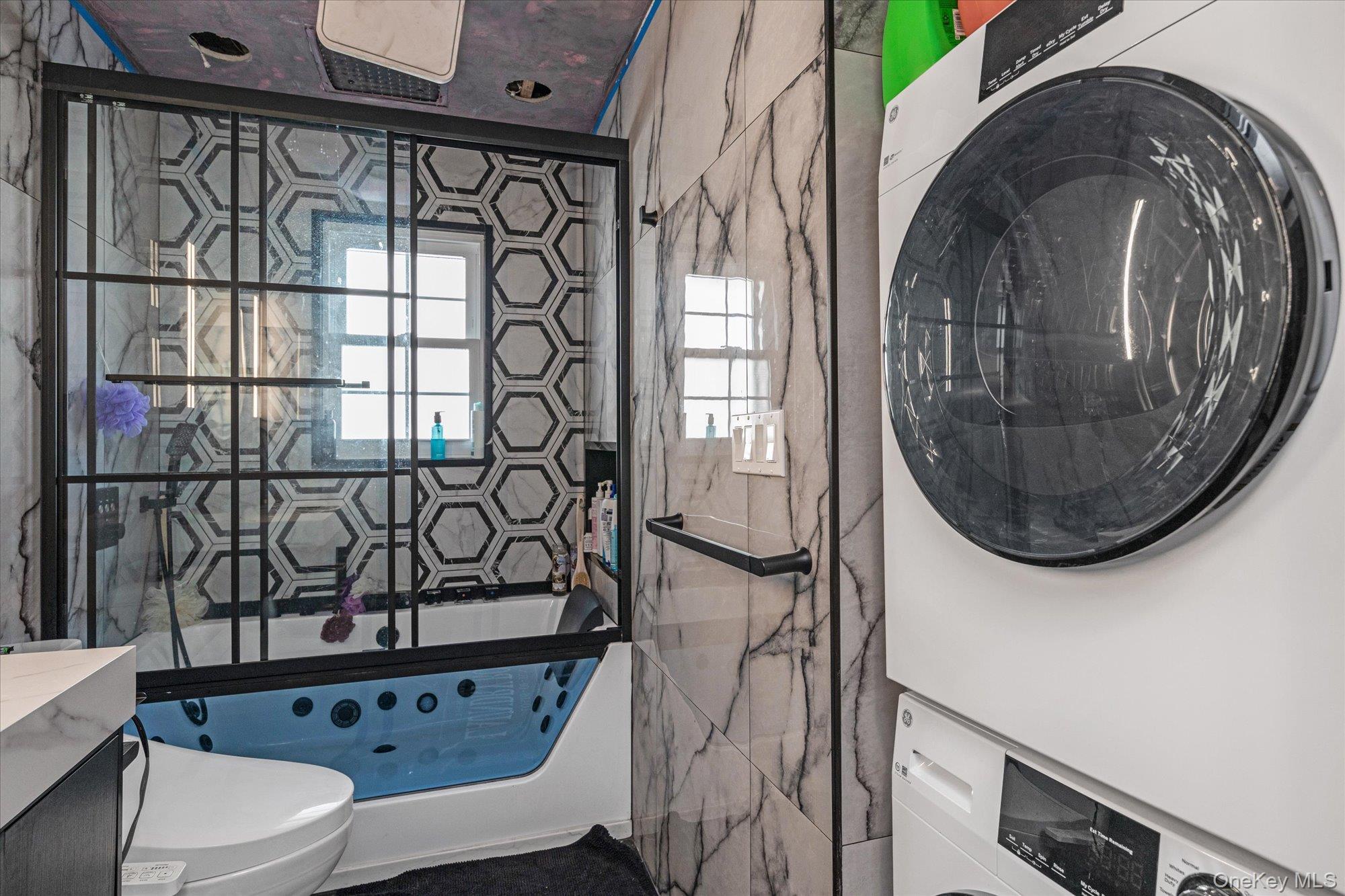 190 Commonwealth Street Franklin Square, NY 11010 - Photo 9 of 16 a bathroom with a toilet and a sink