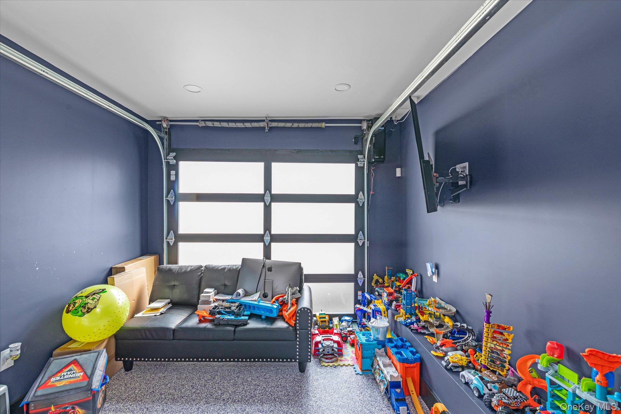190 Commonwealth Street Franklin Square, NY 11010 - Photo 10 of 16 a children room with toys and a chandelier