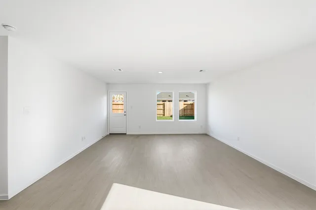 a view of kitchen and windows