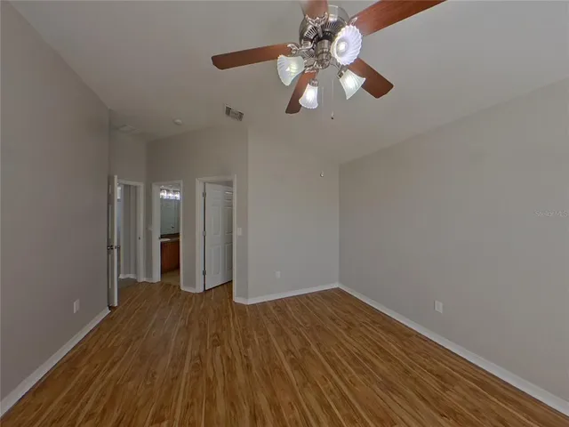 a view of a livingroom with wooden floor