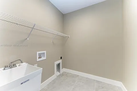 a bathroom with a sink and vanity