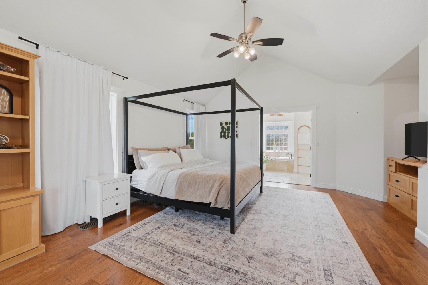 10120 Shenandoah Road Plymouth, CA 95669 - Photo 62 of 86 a bed room with a bed and a flat screen tv