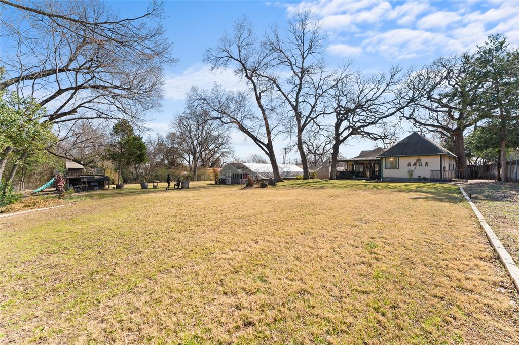 805 East Shady Grove Road Irving, TX 75060 - Photo 25 of 36 View of 1.6 acre yard