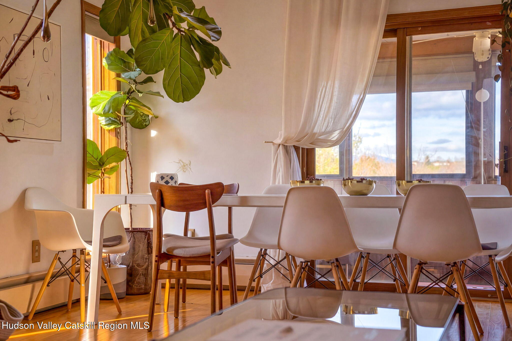 251 Sleepy Hollow Road Athens, NY 12015 - Photo 12 of 60 a view of a dining room with furniture and a window