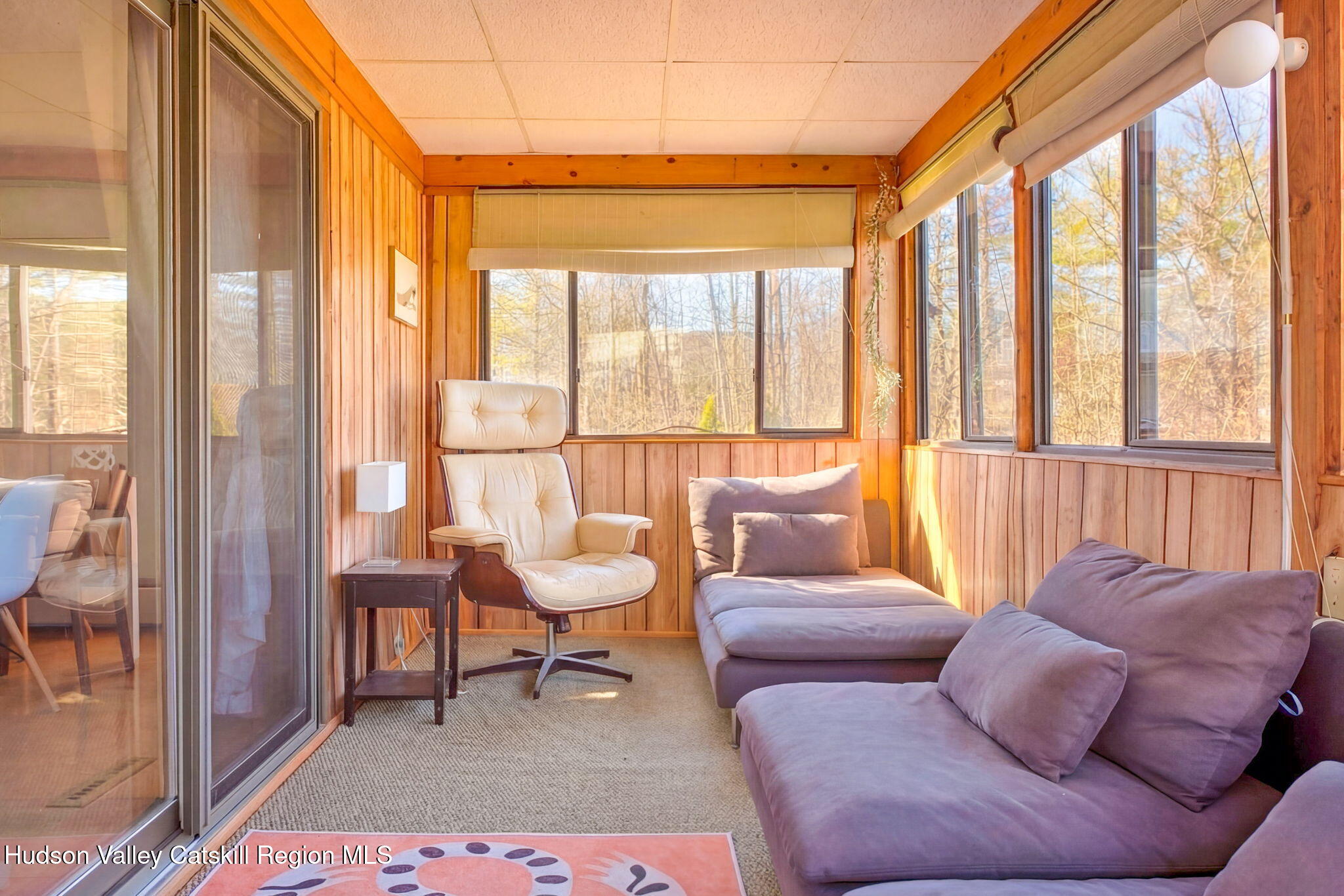251 Sleepy Hollow Road Athens, NY 12015 - Photo 13 of 60 a living room with furniture and a large window