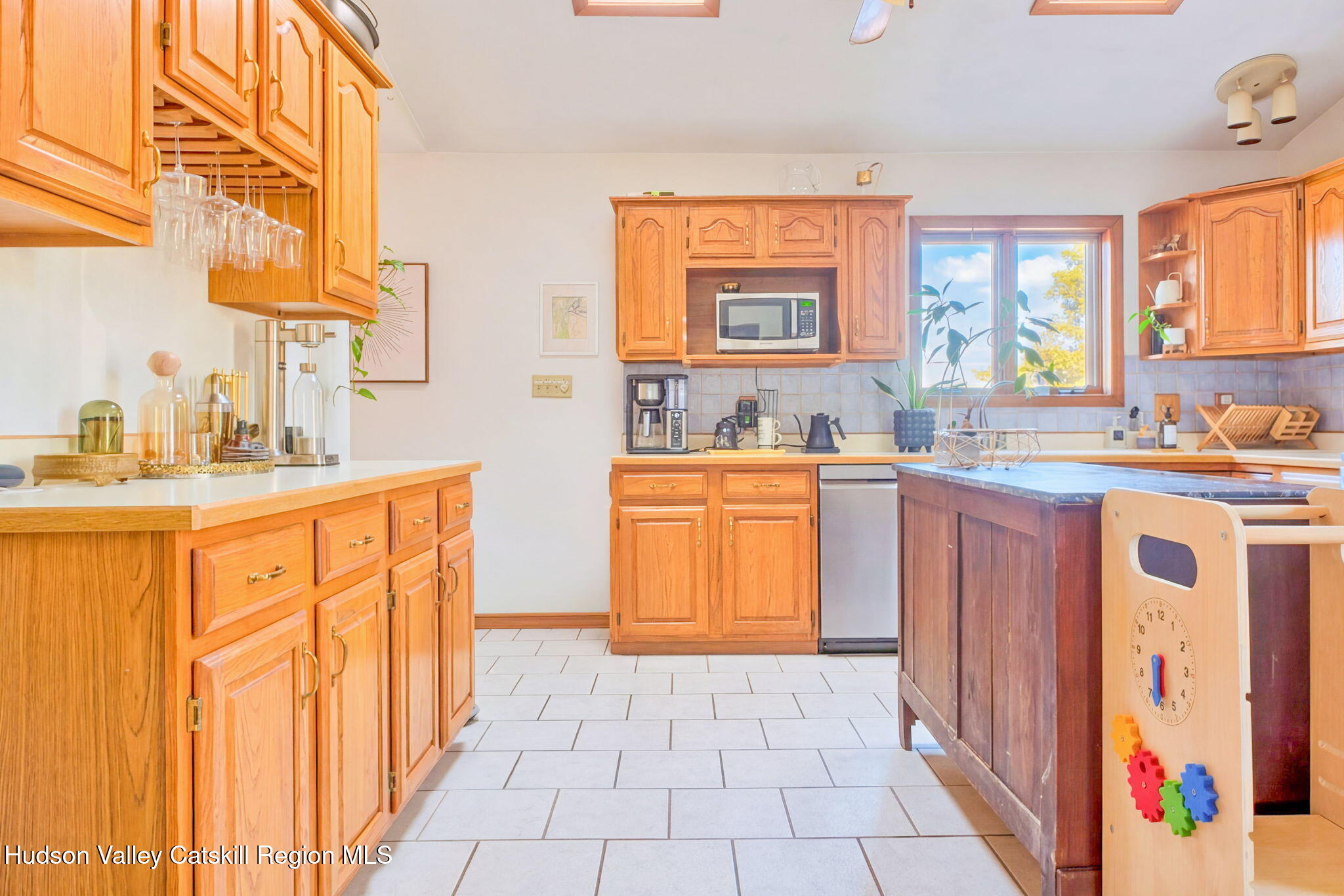 251 Sleepy Hollow Road Athens, NY 12015 - Photo 15 of 60 a kitchen with a sink stove and cabinets