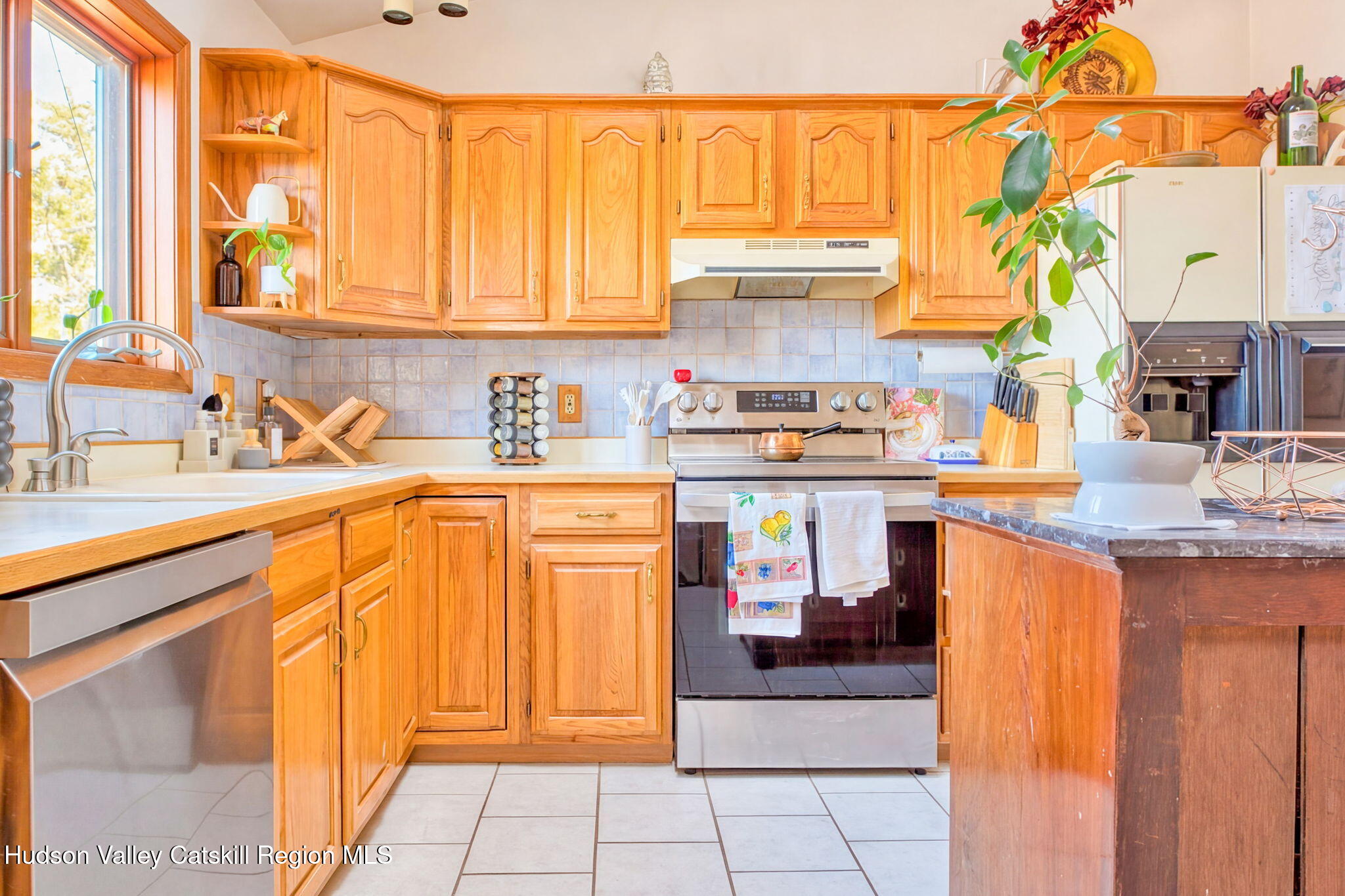 251 Sleepy Hollow Road Athens, NY 12015 - Photo 16 of 60 a kitchen with stainless steel appliances granite countertop a sink and cabinets