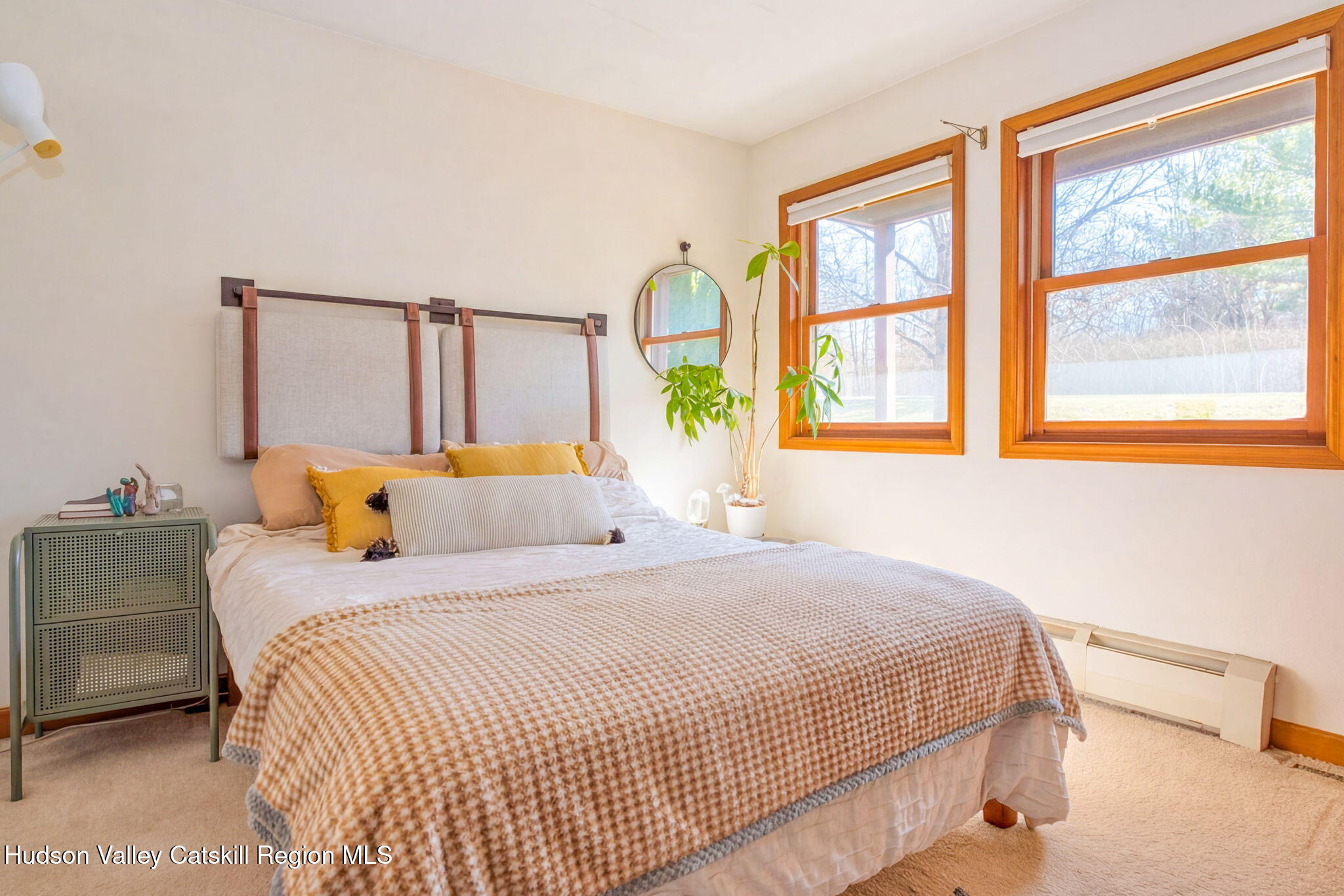 251 Sleepy Hollow Road Athens, NY 12015 - Photo 24 of 60 a bedroom with a bed and a window