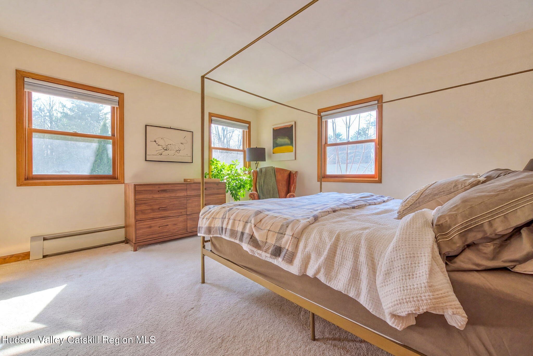 251 Sleepy Hollow Road Athens, NY 12015 - Photo 28 of 60 a bedroom with a bed lamp and a window