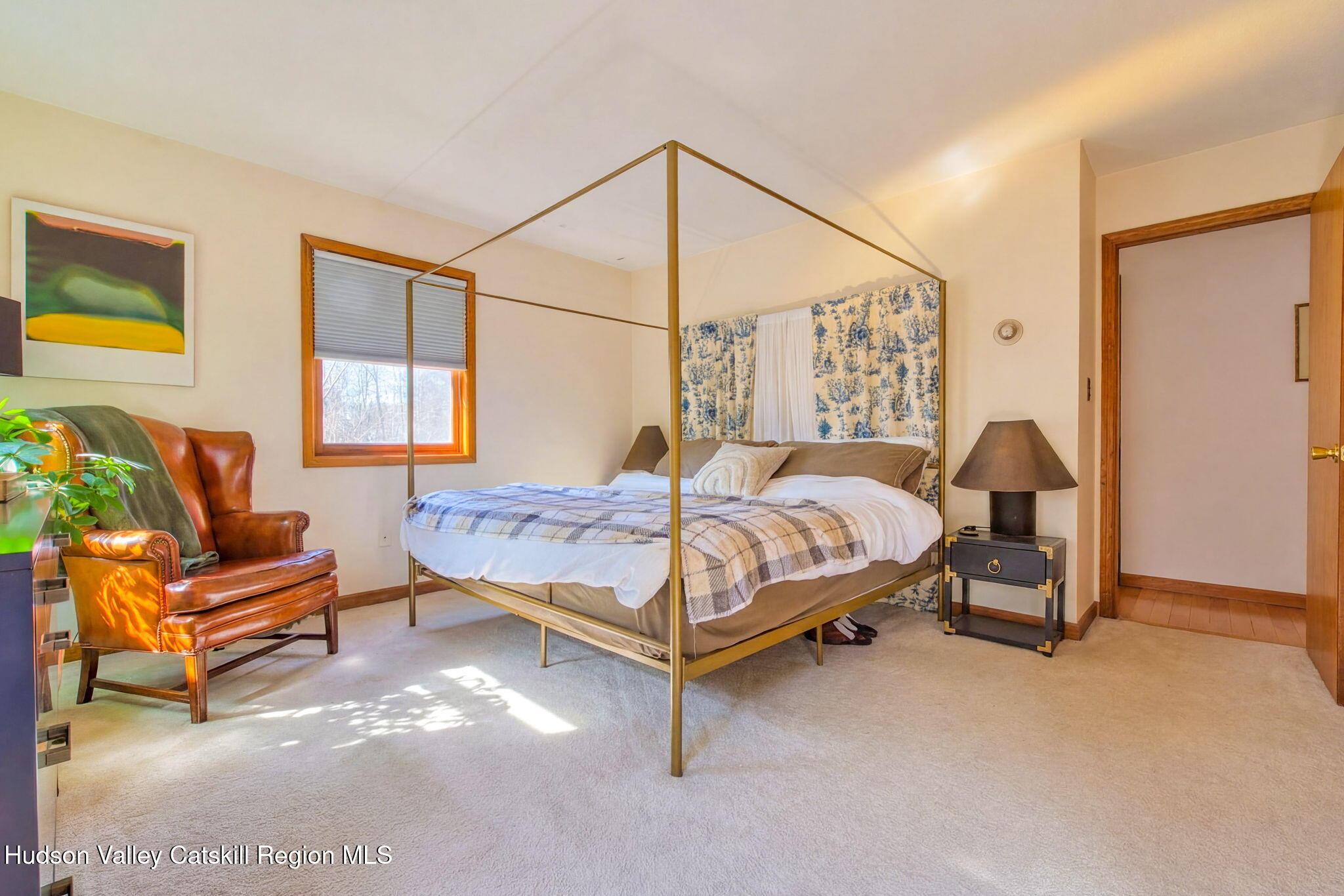 251 Sleepy Hollow Road Athens, NY 12015 - Photo 29 of 60 a bedroom with a bed and table chair