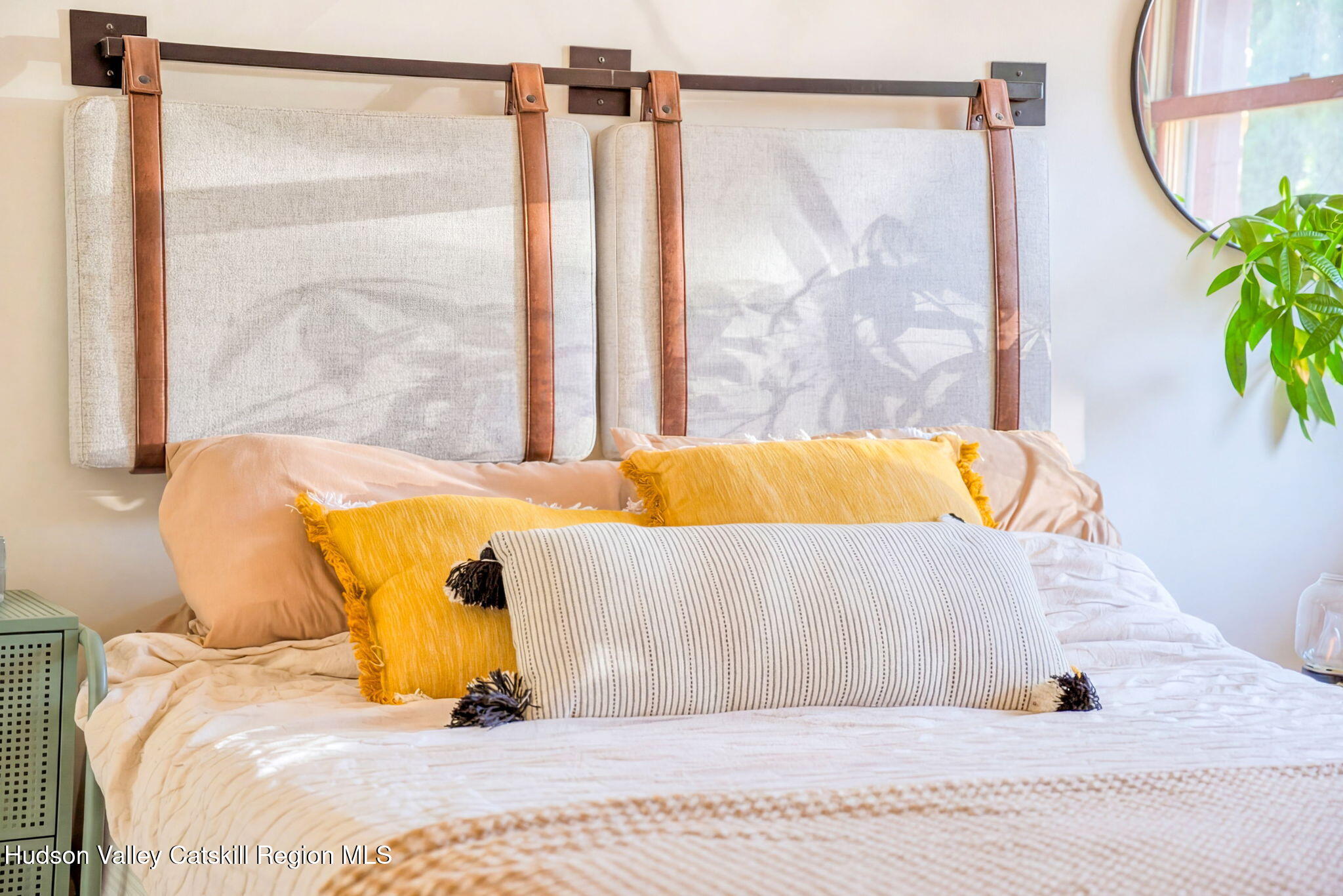 251 Sleepy Hollow Road Athens, NY 12015 - Photo 32 of 60 a bed sitting in a bedroom next to a window