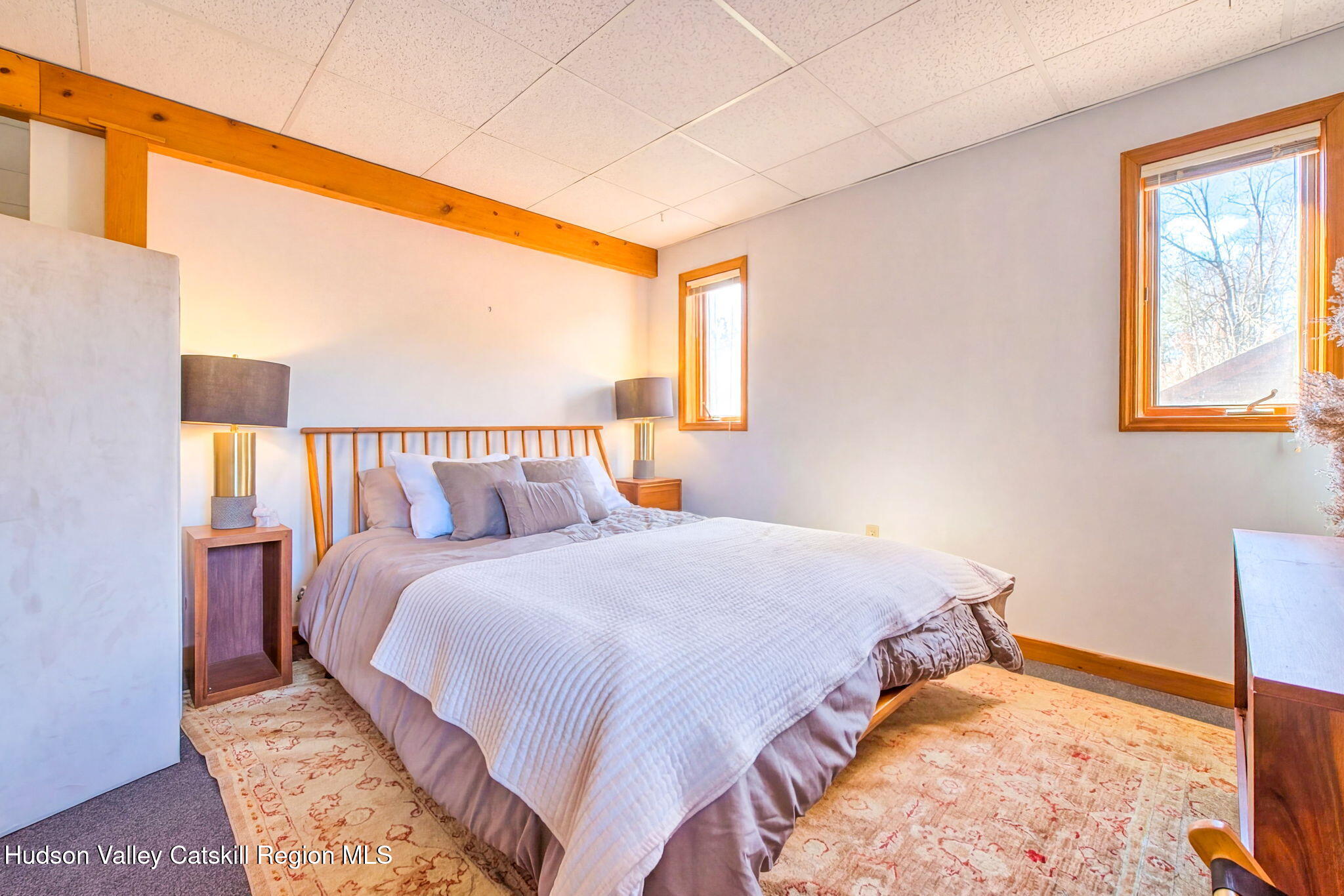 251 Sleepy Hollow Road Athens, NY 12015 - Photo 40 of 60 a bedroom with a large bed and a window