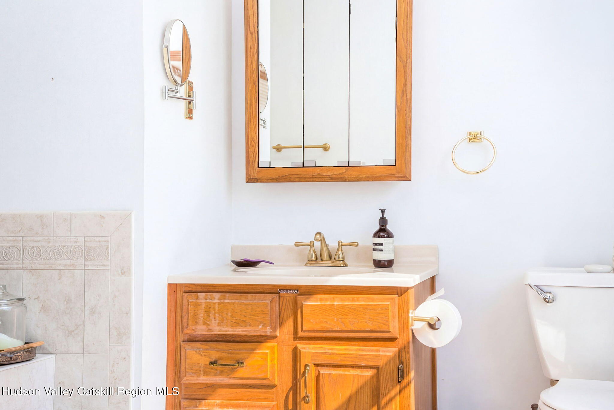 251 Sleepy Hollow Road Athens, NY 12015 - Photo 48 of 60 a bathroom with a sink and a mirror