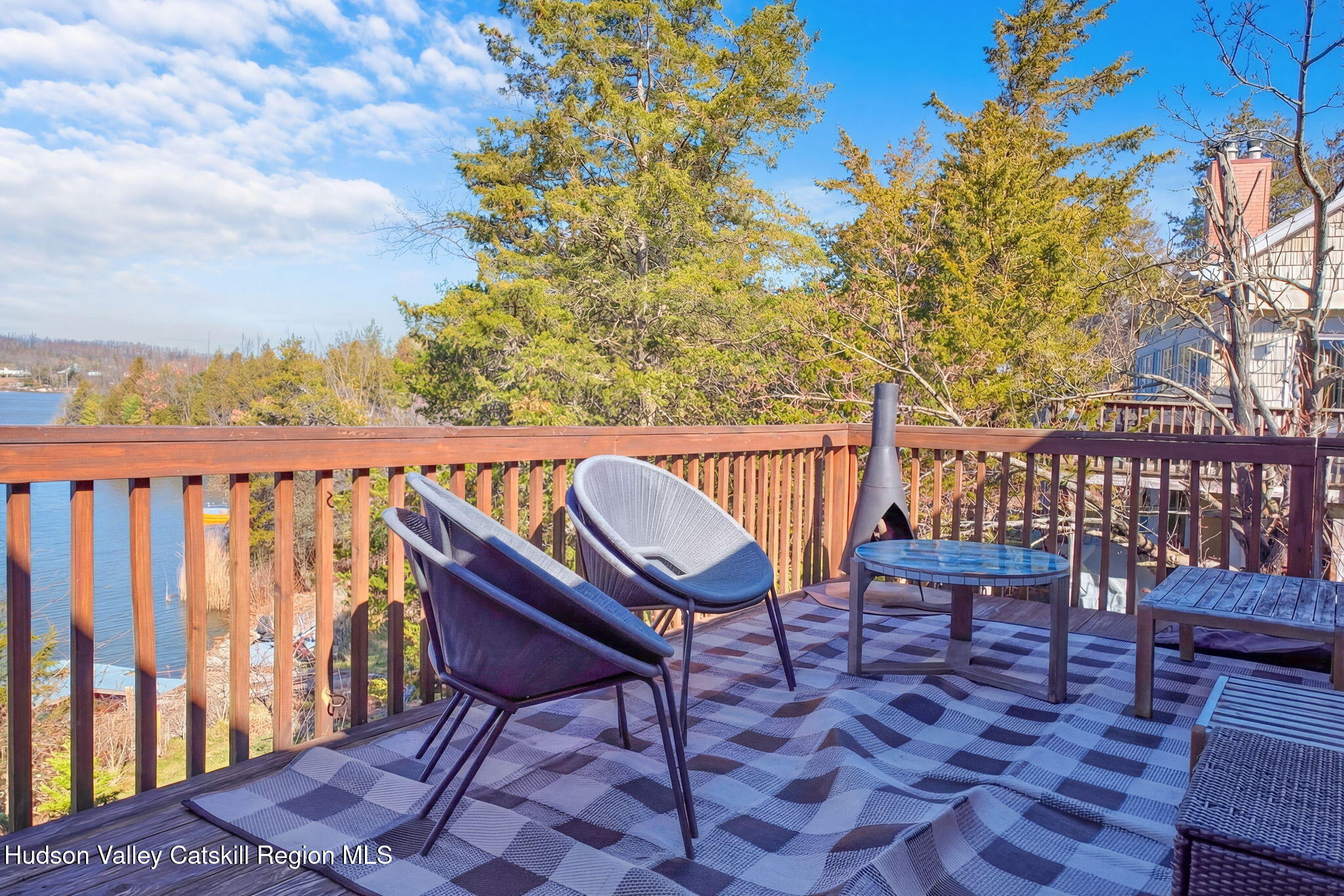 251 Sleepy Hollow Road Athens, NY 12015 - Photo 51 of 60 a roof deck with table and chairs and wooden floor