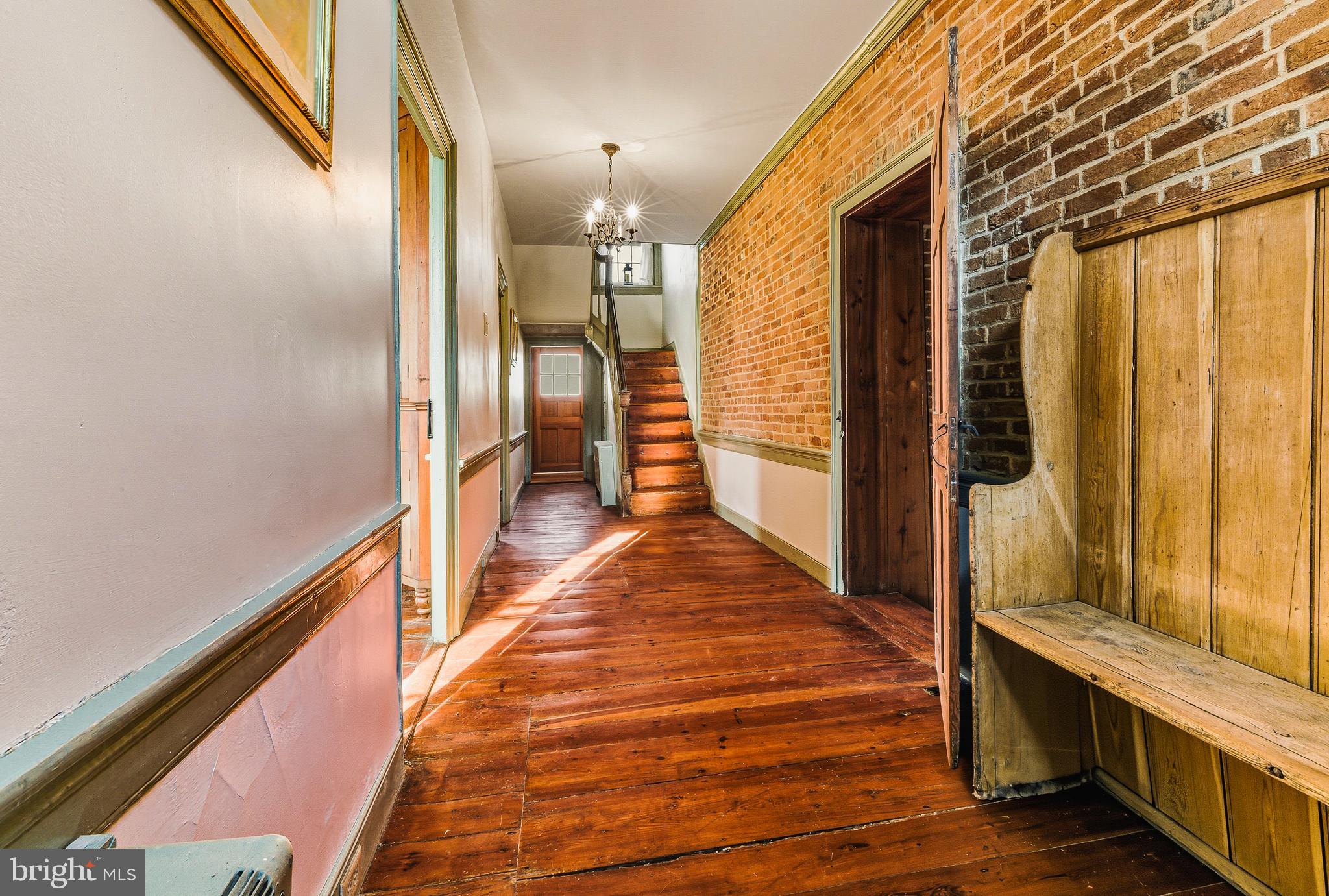 324 Welchville Road Mannington, NJ 08079 - Photo 19 of 50 a view of a hallway with wooden floor and staircase