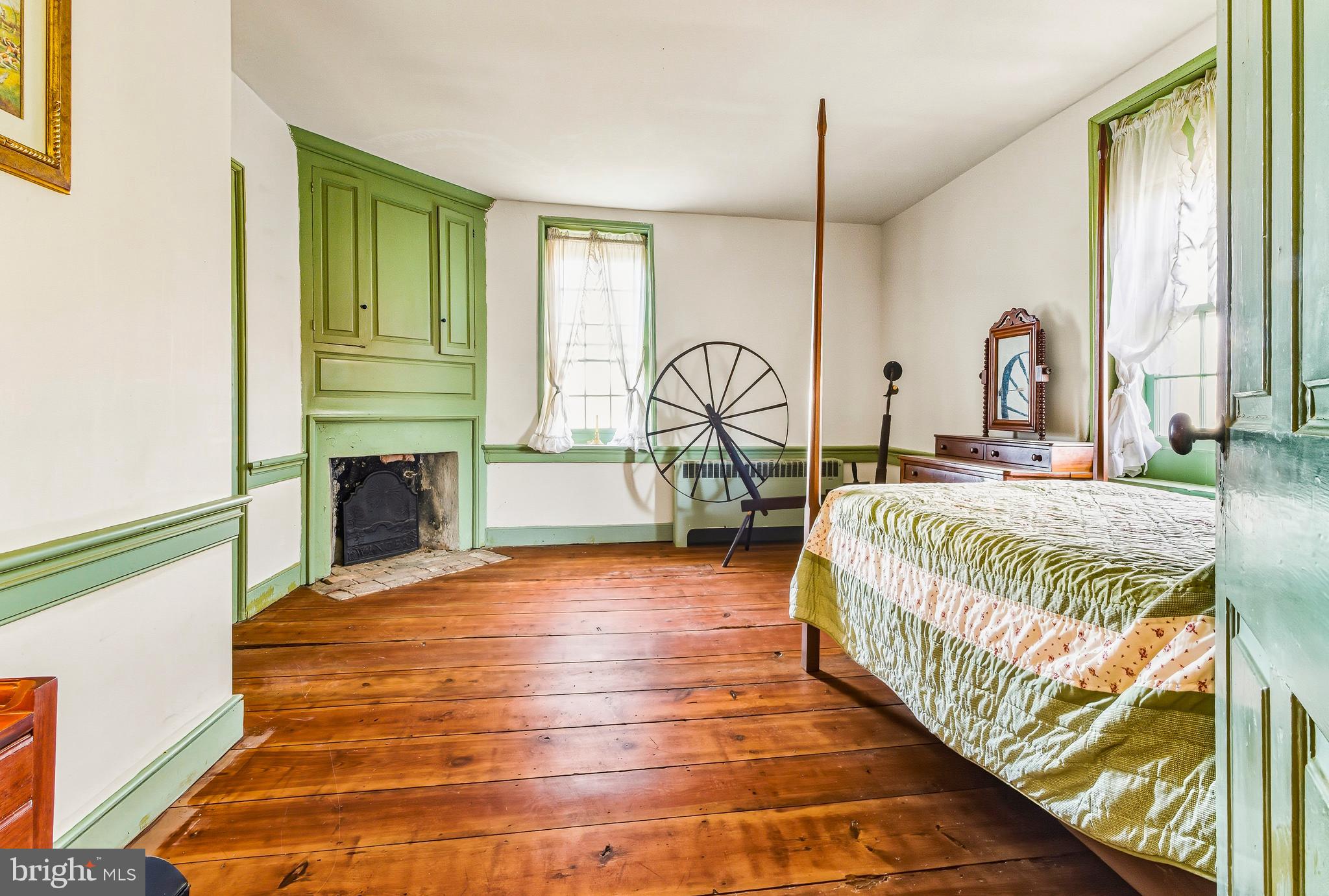 324 Welchville Road Mannington, NJ 08079 - Photo 21 of 50 a bedroom with a bed and a flat tv screen on dresser