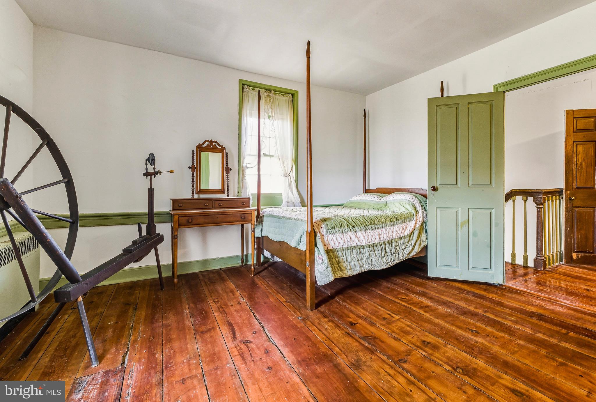 324 Welchville Road Mannington, NJ 08079 - Photo 22 of 50 a bedroom with a bed next to a window