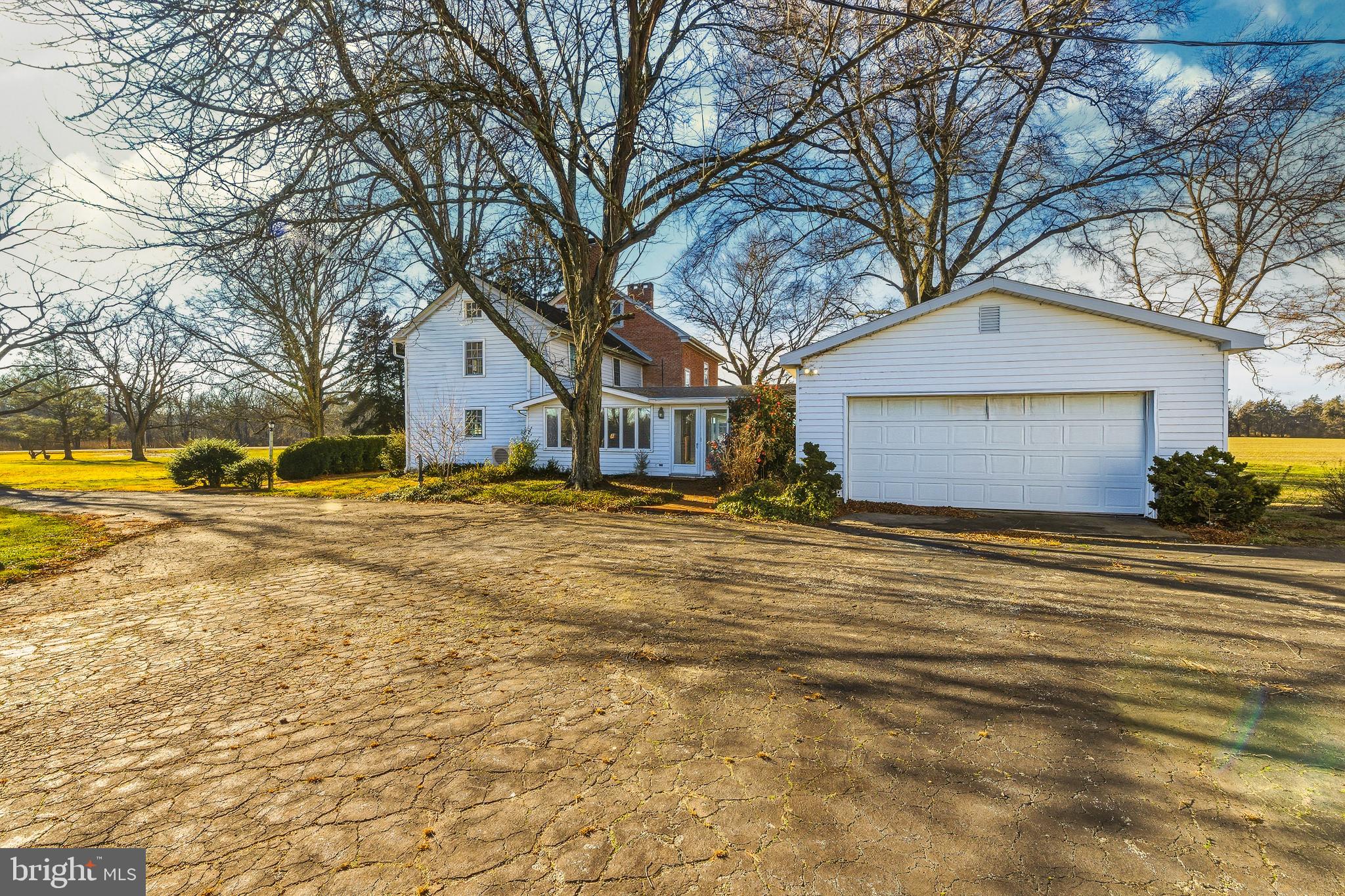 324 Welchville Road Mannington, NJ 08079 - Photo 5 of 50 a front view of house with yard and trees around