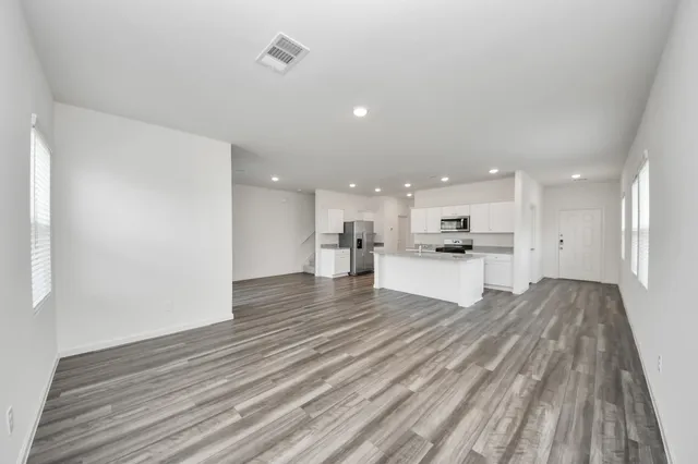 a view of kitchen with wooden floor