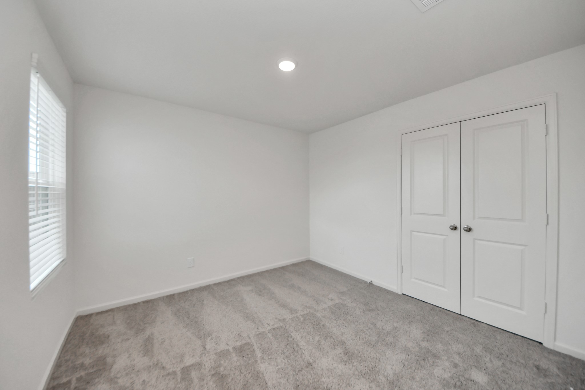 10315 Malta Trce Drive, Unit B Rosharon, TX 77583 - Photo 23 of 49 a view of an empty room and a window