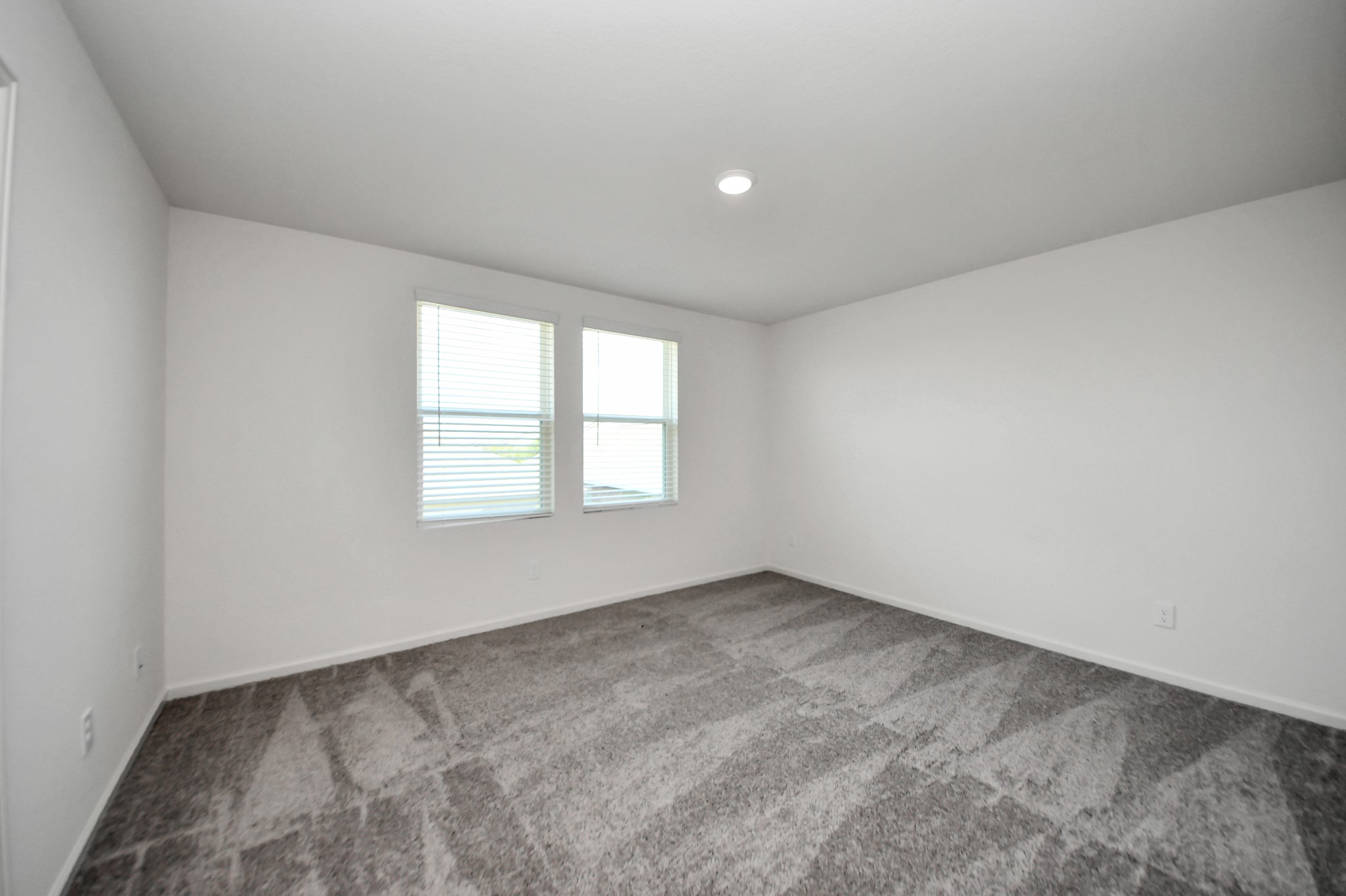 10315 Malta Trce Drive, Unit B Rosharon, TX 77583 - Photo 32 of 49 an empty room with a window
