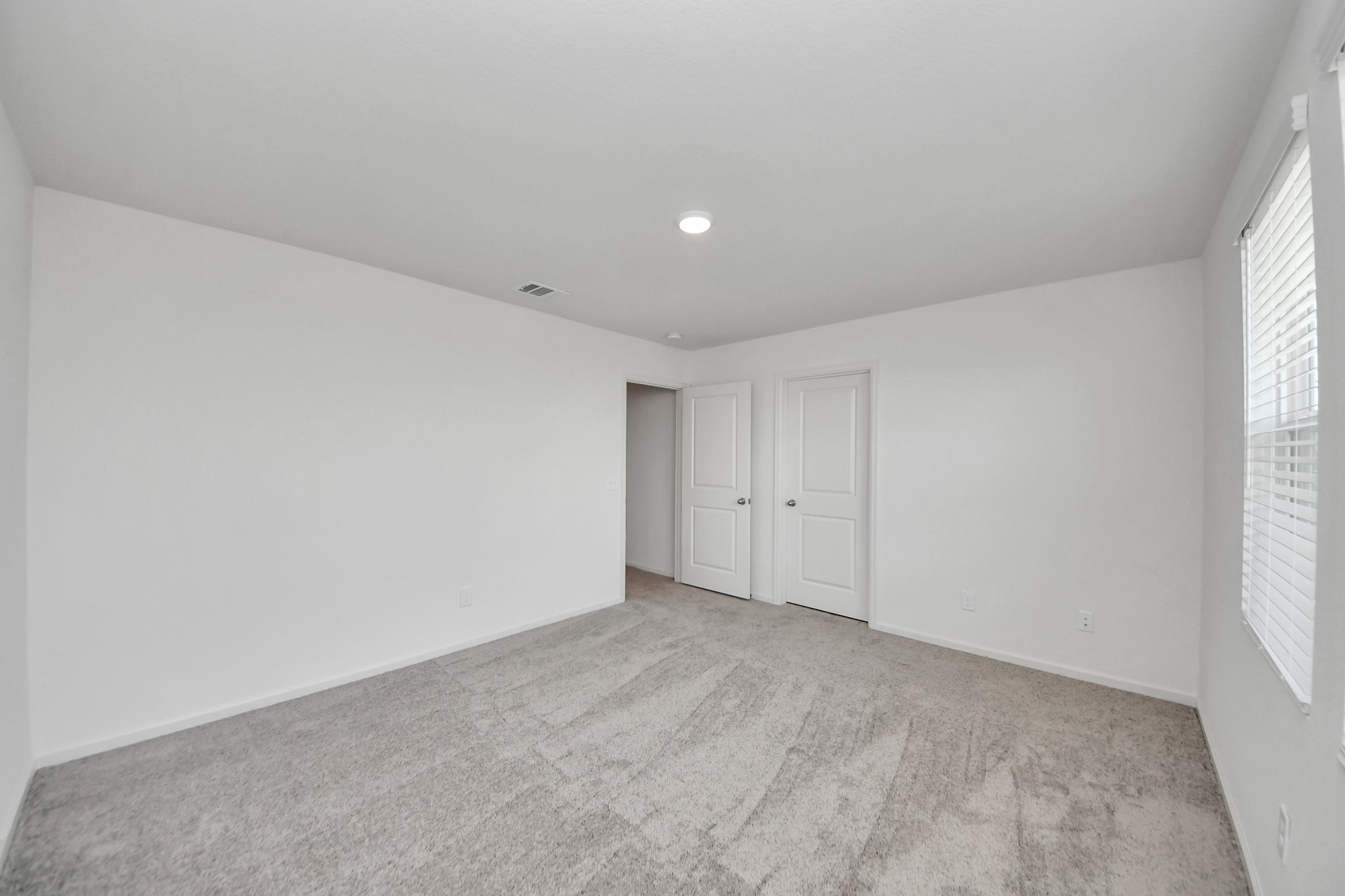10315 Malta Trce Drive, Unit B Rosharon, TX 77583 - Photo 33 of 49 a view of an empty room and a window