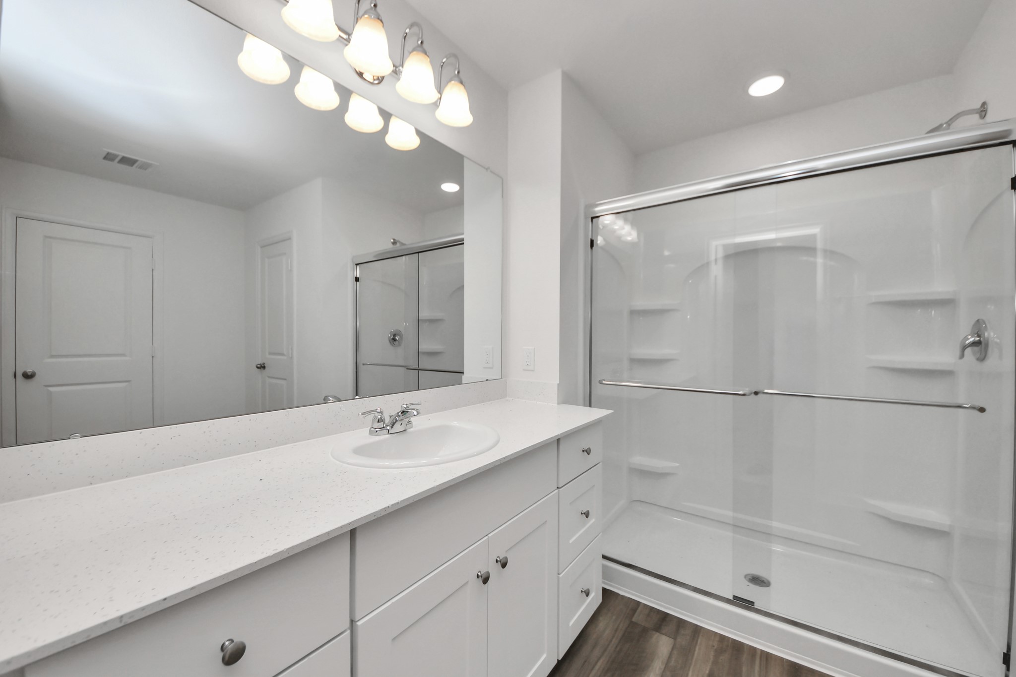 10315 Malta Trce Drive, Unit B Rosharon, TX 77583 - Photo 37 of 49 a bathroom with a sink vanity granite and shower