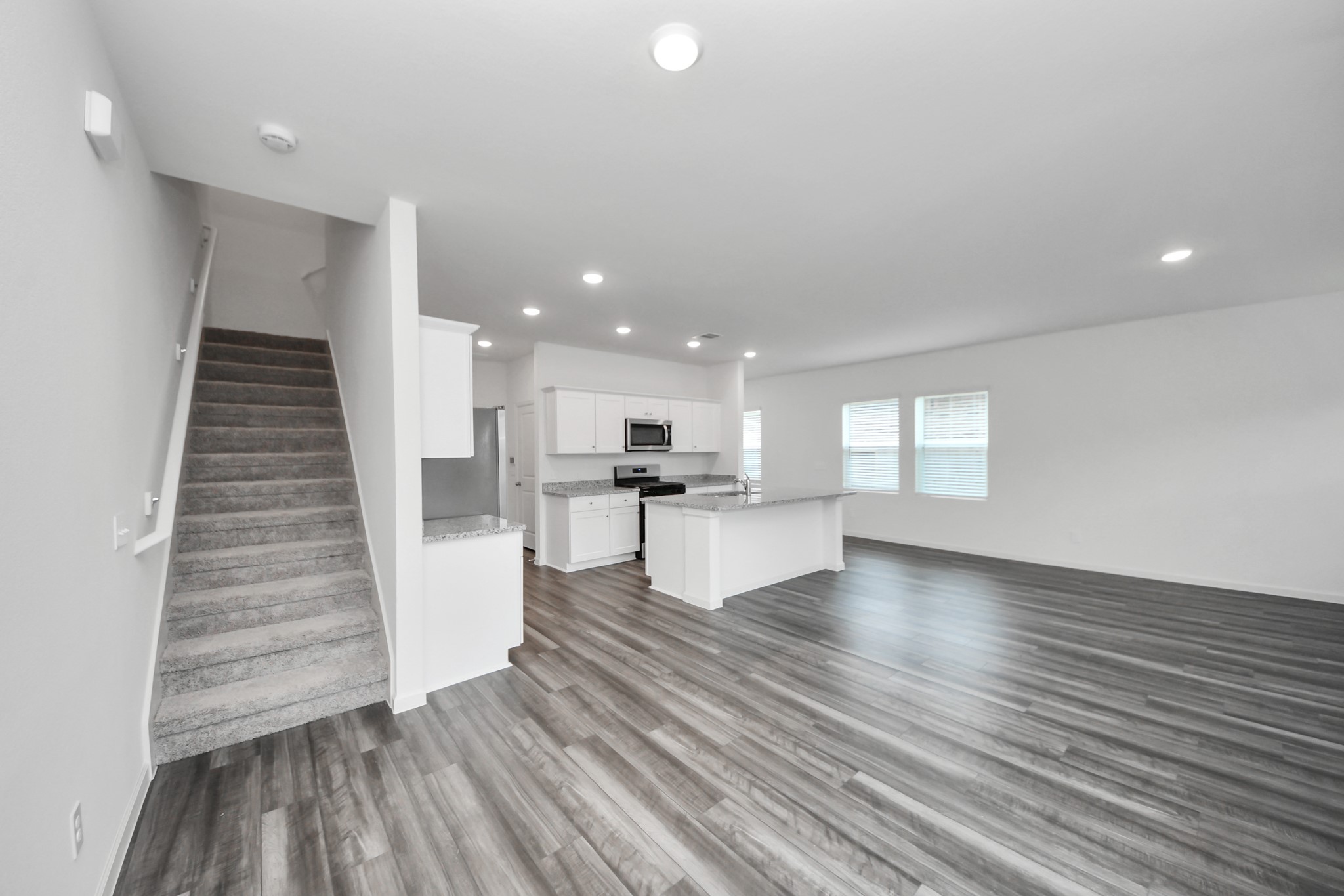 10315 Malta Trce Drive, Unit B Rosharon, TX 77583 - Photo 4 of 49 a view of kitchen with sink and refrigerator