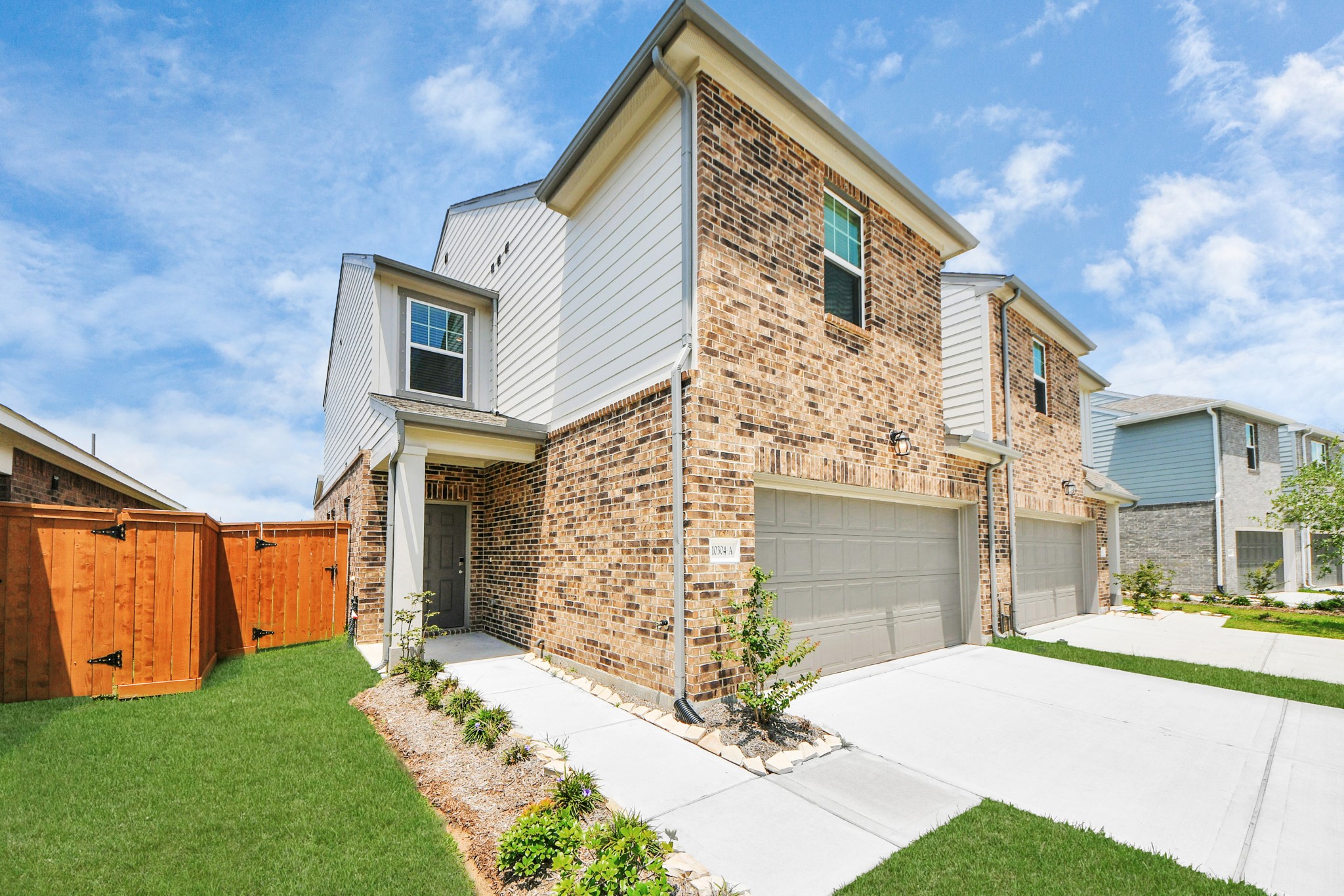 10315 Malta Trce Drive, Unit B Rosharon, TX 77583 - Photo 6 of 49 a front view of a house with a yard