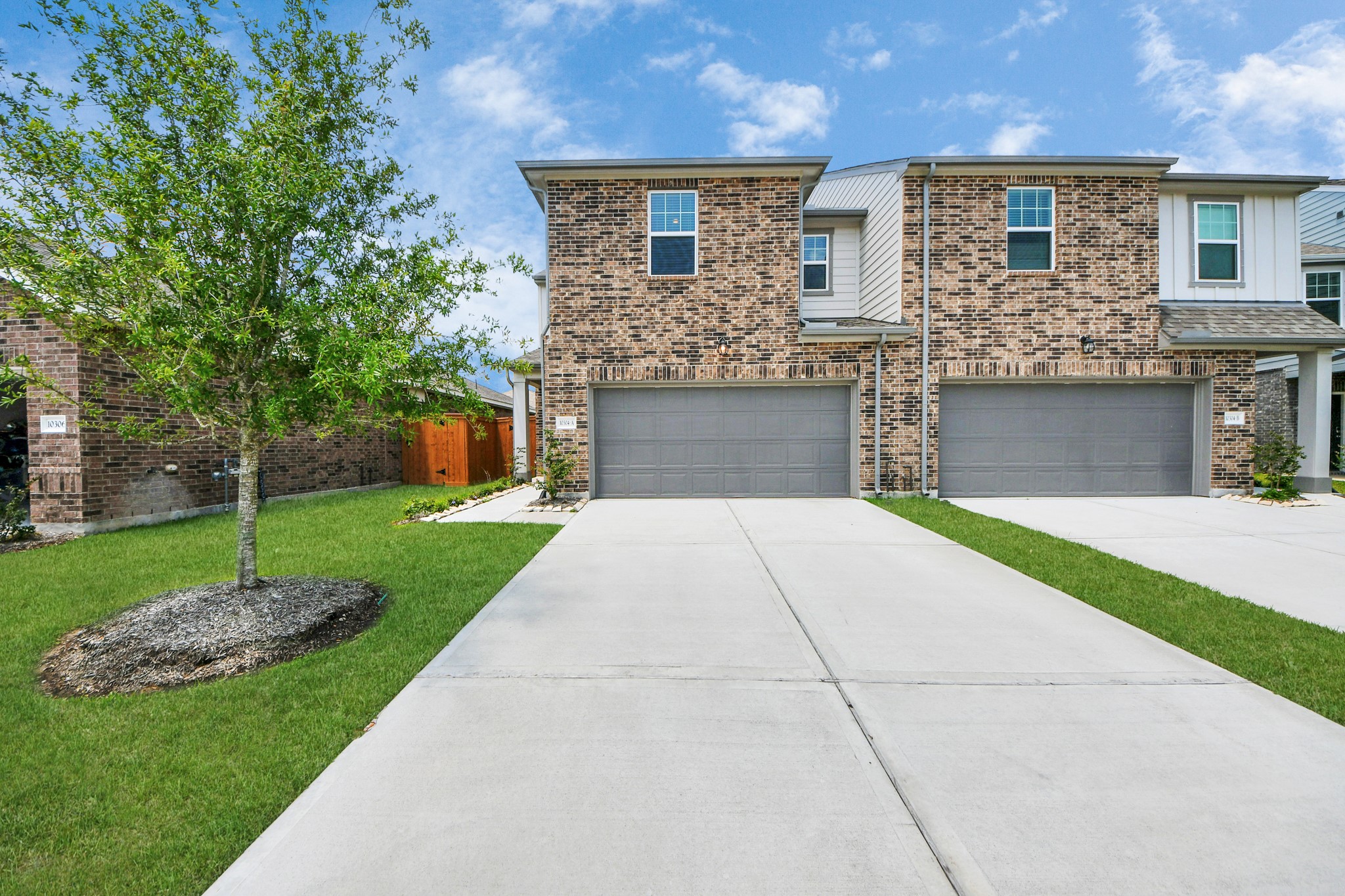 10315 Malta Trce Drive, Unit B Rosharon, TX 77583 - Photo 9 of 49 a front view of a house with garden