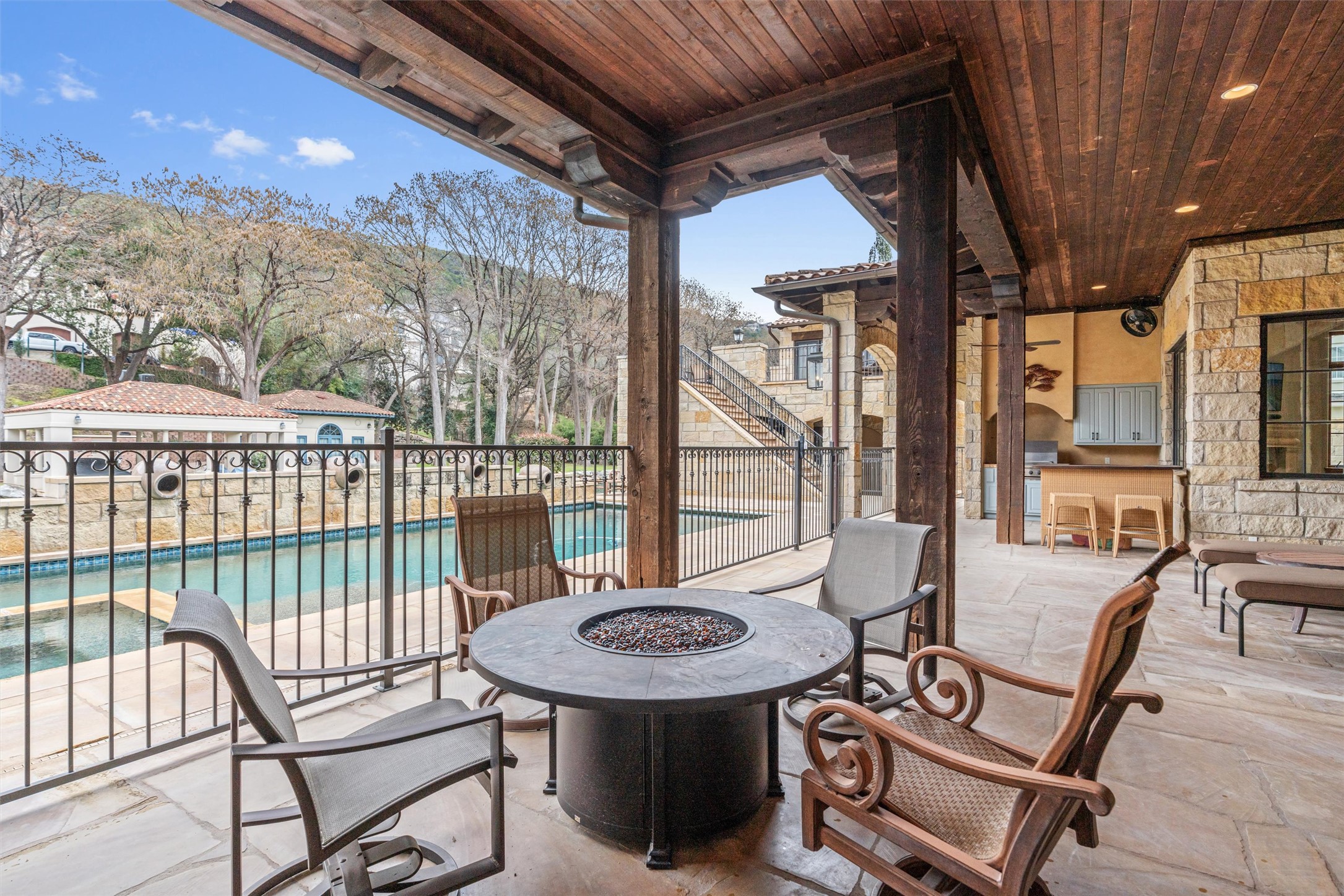 4407 Island Cove Austin, TX 78731 - Photo 20 of 40 a view of a patio with a table chairs and backyard