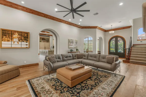 a living room with furniture and a rug