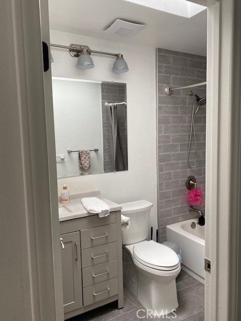 29095 Madrid Road Laguna Niguel, CA 92677 - Photo 22 of 36 a bathroom with a granite countertop toilet sink and mirror