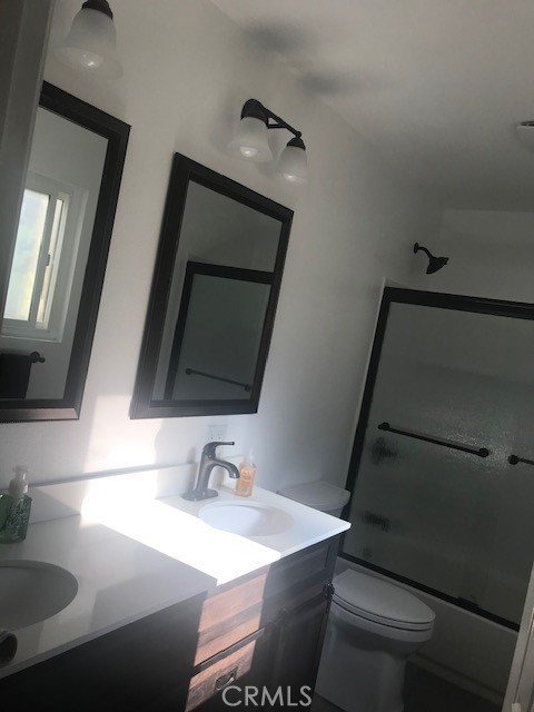 29095 Madrid Road Laguna Niguel, CA 92677 - Photo 25 of 36 a bathroom with a sink and a mirror