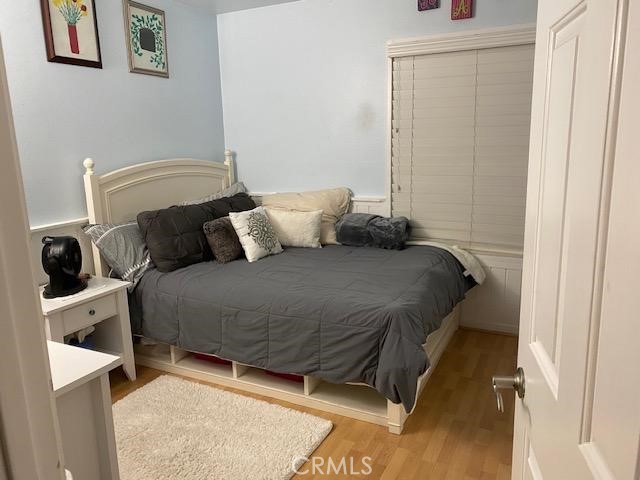 29095 Madrid Road Laguna Niguel, CA 92677 - Photo 26 of 36 a bedroom with a bed and a window