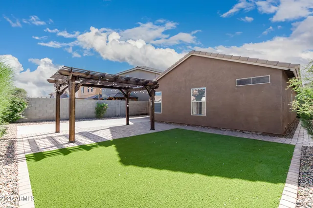 a view of a backyard with a garden