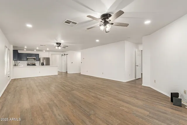 a view of a livingroom with a kitchen