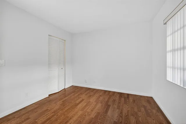 a view of a hallway with a chandelier