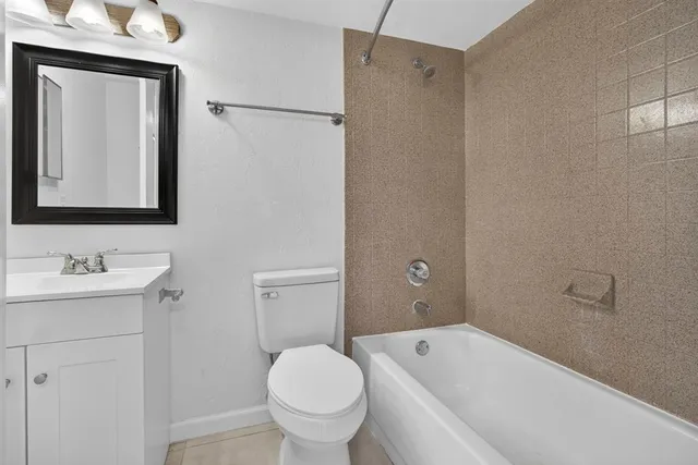 a view of a building with a yard