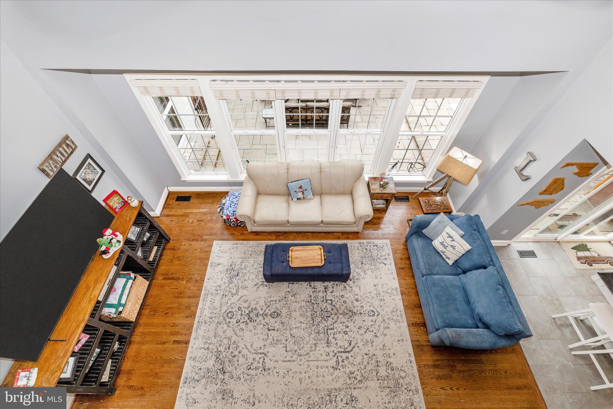 11306 Country Club Road New Market, MD 21774 - Photo 18 of 77 a living room with furniture and a flat screen tv