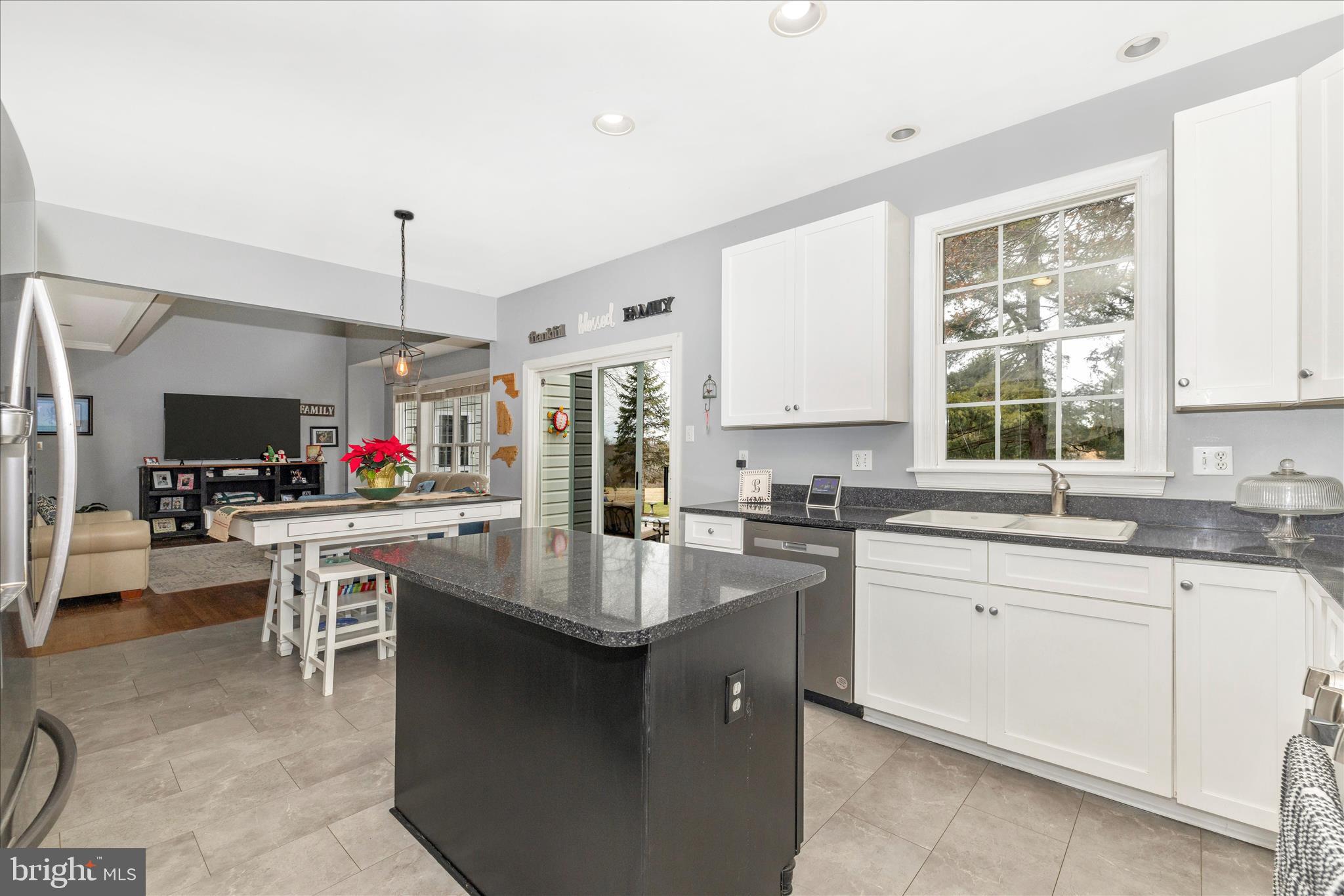 11306 Country Club Road New Market, MD 21774 - Photo 22 of 77 a kitchen with sink a microwave and cabinets