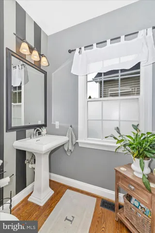 a living room with lots of furniture and a flat screen tv