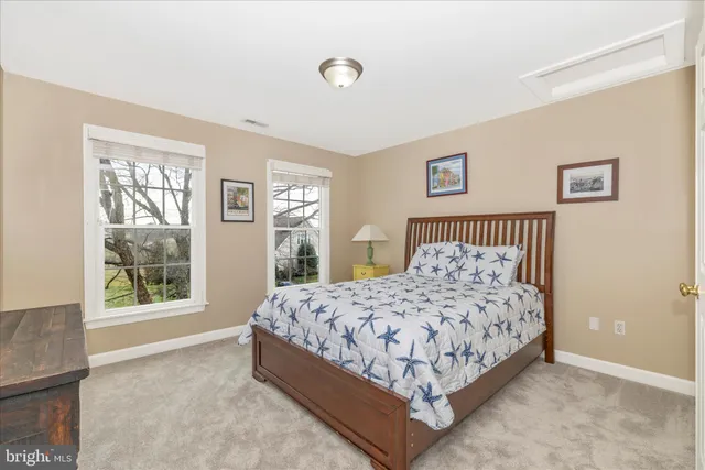 a living room with lots of furniture and a flat screen tv