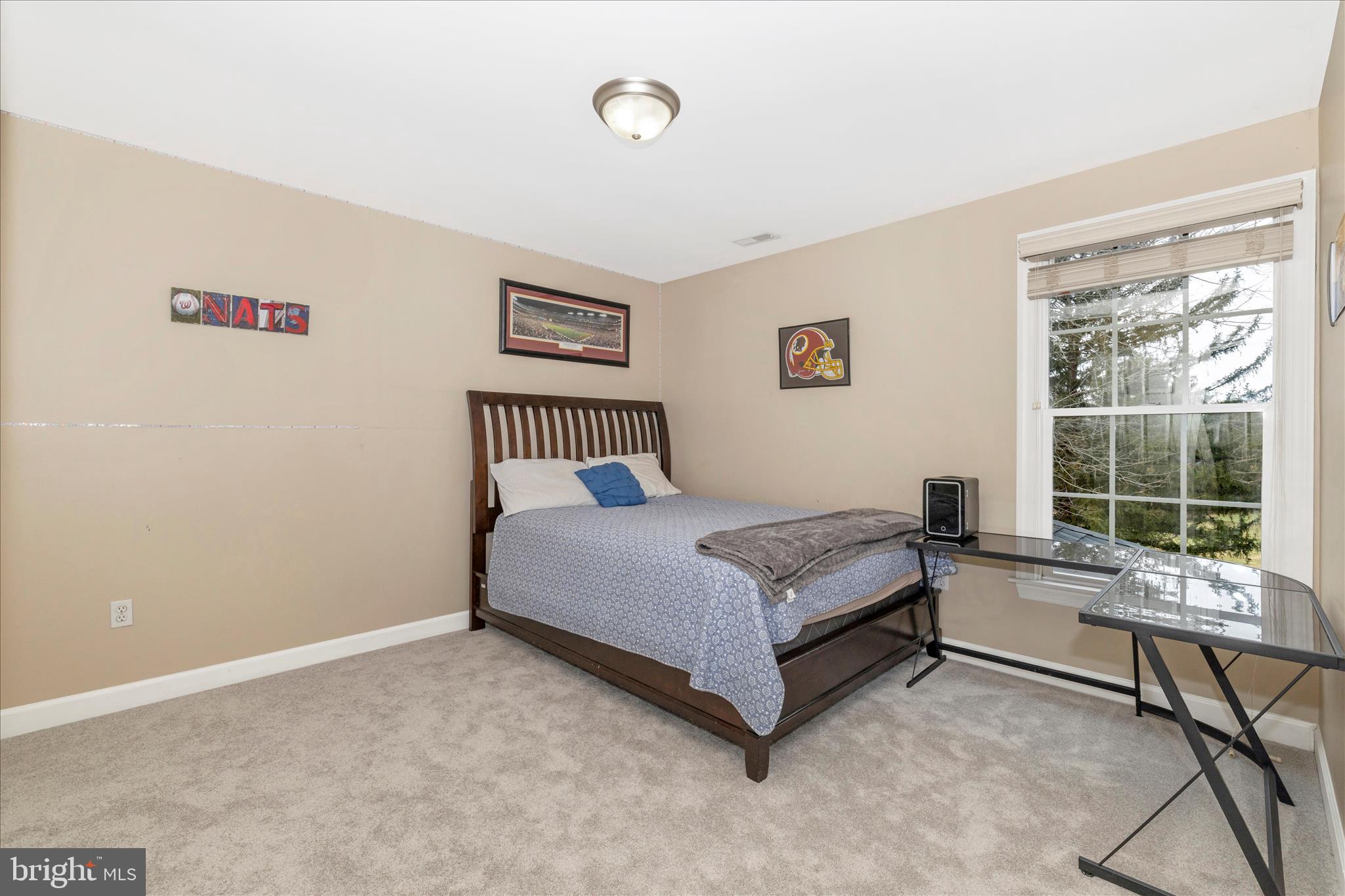 11306 Country Club Road New Market, MD 21774 - Photo 34 of 77 a bedroom with a bed and a window