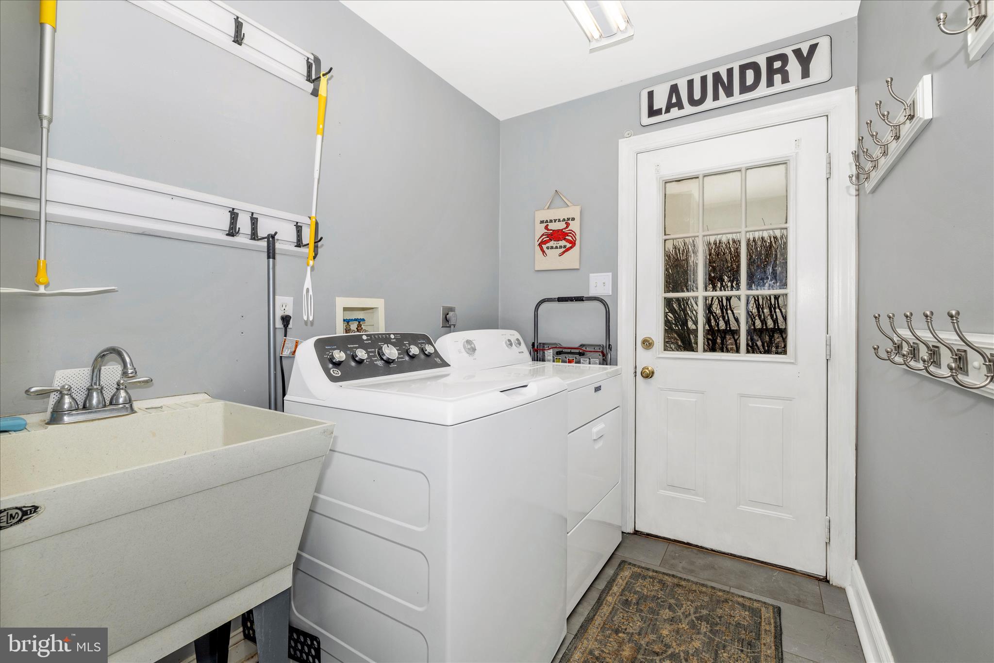 11306 Country Club Road New Market, MD 21774 - Photo 36 of 77 a bathroom with a sink and a mirror