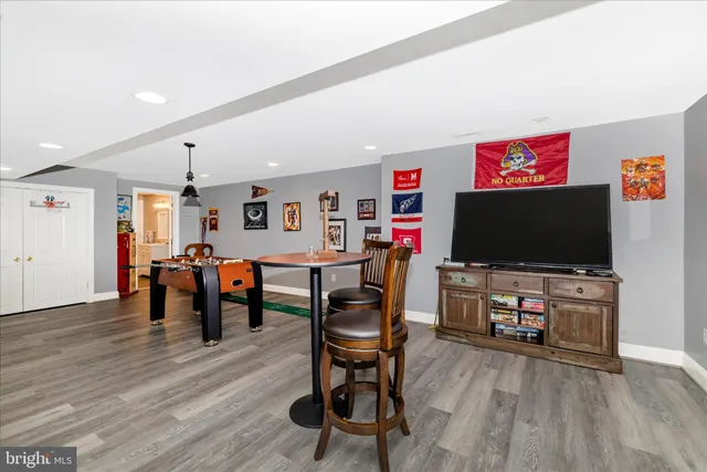 a view of a balcony with two chairs and a table
