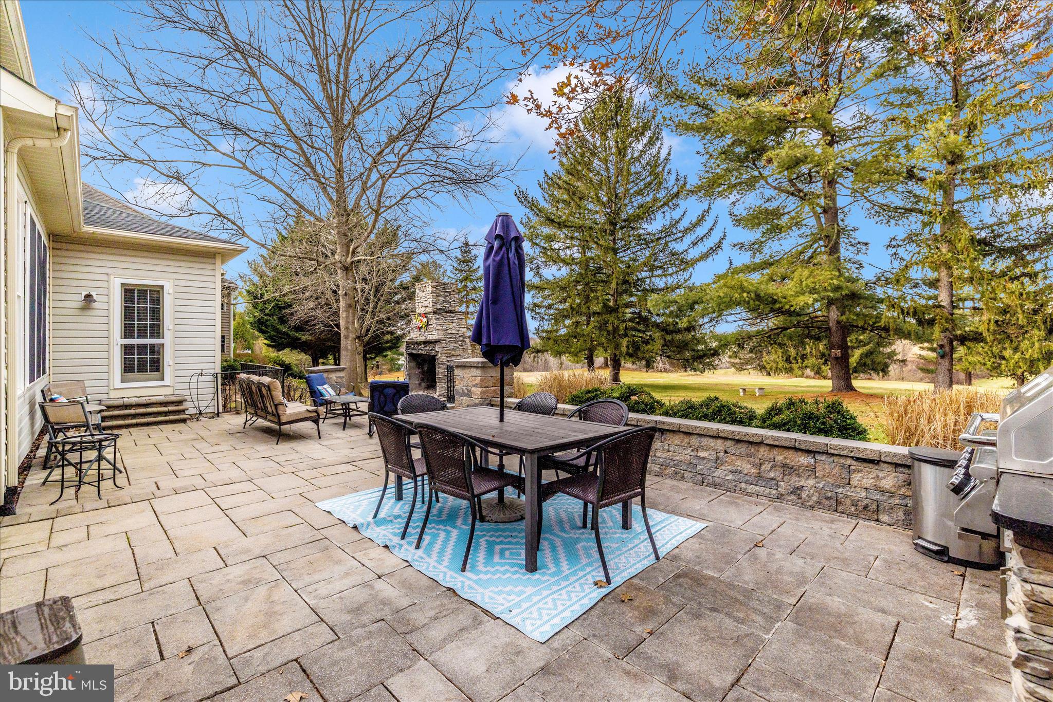 11306 Country Club Road New Market, MD 21774 - Photo 52 of 77 a view of a patio with a table and chairs