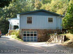 190 Rattlesnake Branch Road Canton, NC 28716 - Photo 2 of 9 a view of a house with a yard