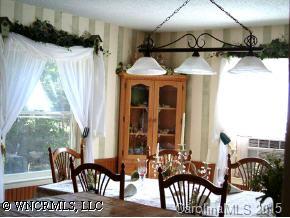 190 Rattlesnake Branch Road Canton, NC 28716 - Photo 7 of 9 a view of a dining room with furniture window and outside view